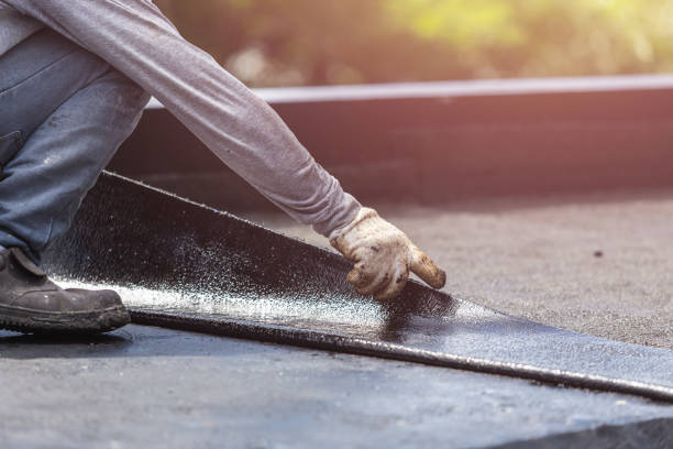 Professional Basement Waterproofing technician working in Erwin, NC